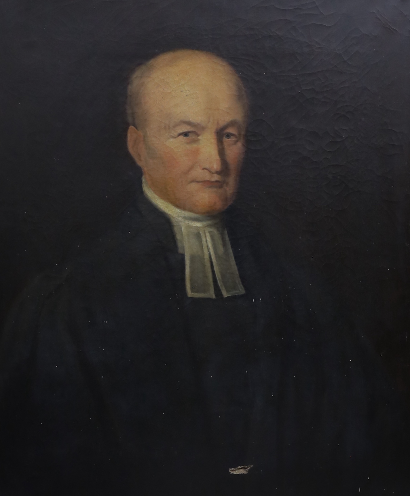 19th century English School, oil on canvas, Half length portrait of a clergyman, 75 x 62cm